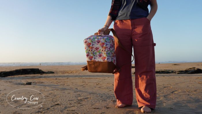 Sedron backpack on the beach, made with Blended Thread vinyl