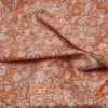 orange cotton fabric with white floral print