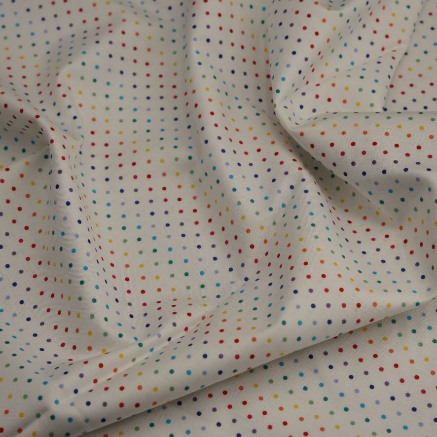 white cotton with rainbow dot design