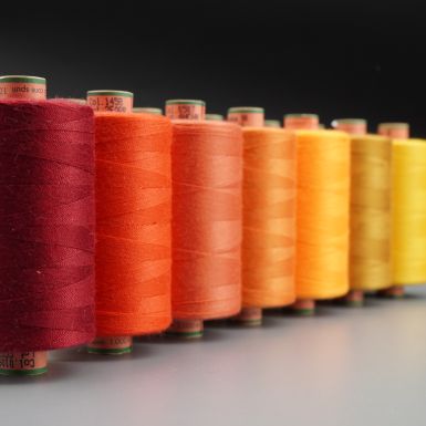 Amann Tex 40 thread in various red, orange and yellow colours