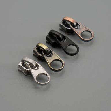 small metal zip pulls in various colours