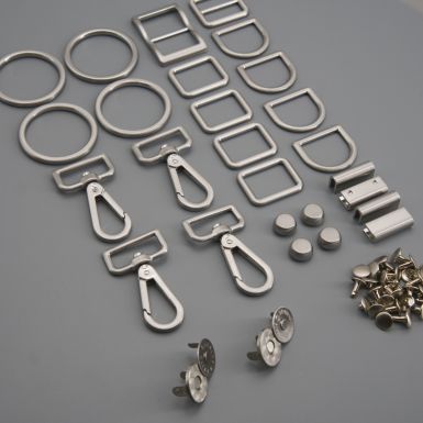 Selection of brushed silver metal hardware for bag making