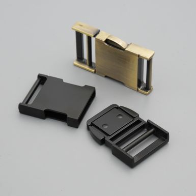 metal side release buckle in black and brass