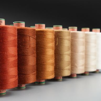 Amann tex 40 threads in various brown and white colours