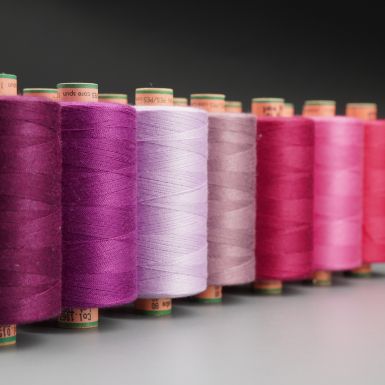 Amann tex 40 thread in various purple and pink colours