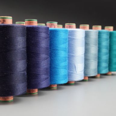 Amann tex 40 threads in various blue and teal colours